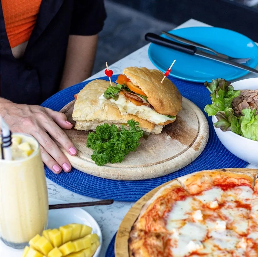 Italian sandwich served with salad
