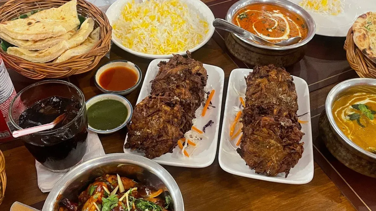 Indian feast with tandoori dishes, curries, rice and breads
